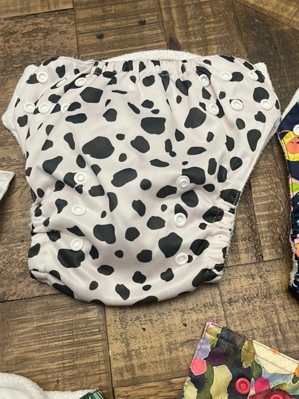 Sunbaby reusable cloth baby diapers with adjustable snaps to grow with baby